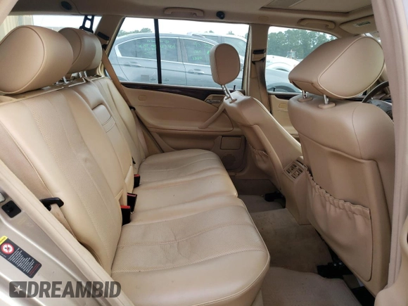 2001 Mercedes-Benz E-Class with VIN WDBJH65J41B312277, listed as a Copart auction lot 70261594 with 123,702 mi miles and Clean Title. Bid and sale history available at carsss.com. Image 10.