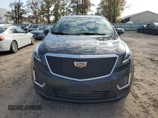 2021 Cadillac XT5 AWD Sport with VIN 1GYKNHRS3MZ103180, listed as a Copart auction lot 77166714 with 17,659 mi miles and Salvage title. Bid and sale history available at DreamBid. Image 5.