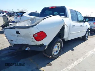 2003 Ford F-150 XLT with VIN 1FTRW07653KC82984, listed as a IAAI auction lot 42282305 with 933,470 mi miles and . Bid and sale history available at DreamBid. Image 4.
