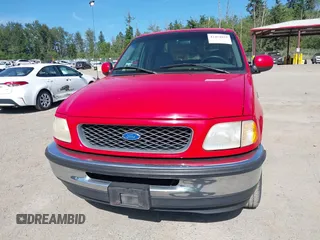 1997 Ford F-150 with VIN 2FTEX17L9VCA27687, listed as a IAAI auction lot 42454035 with 122,179 mi miles and . Bid and sale history available at DreamBid. Image 6.