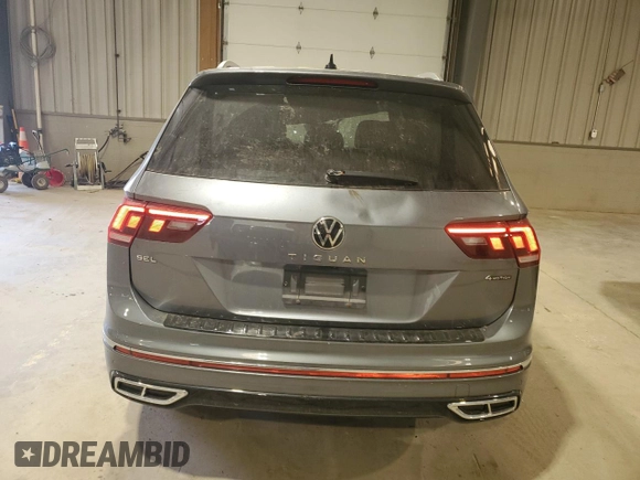 2023 Volkswagen Tiguan SEL R-Line with VIN 3VV4B7AX3PM072402, listed as a Copart auction lot 56656515 with 13,686 mi miles and Salvage title. Bid and sale history available at DreamBid. Image 6.