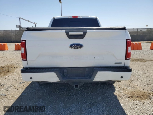 2018 Ford F-150 XL with VIN 1FTEW1CPXJKD45092, listed as a Copart auction lot 57289105 with 96,011 mi miles and Salvage title. Bid and sale history available at DreamBid. Image 6.