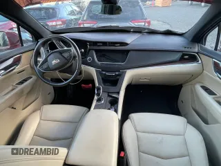 2019 Cadillac XT5 Premium Luxury AWD z VIN 1GYKNFRS2KZ251595, wystawiony jako Copart lot #56428045 z przebiegiem 23 925 mil mil oraz Szkoda całkowita • Salvage title. Historia ofert i sprzedaży dostępna na DreamBid. Obrazek 9.
