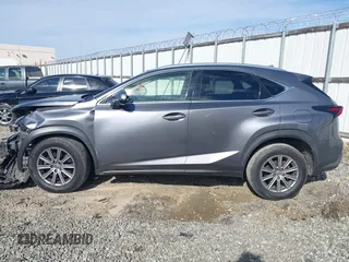 2016 Lexus NX 200t with VIN JTJYARBZ9G2036927, listed as a IAAI auction lot 41609837 with 215,448 mi miles. Bid and sale history available at carsss.com. Image 14.