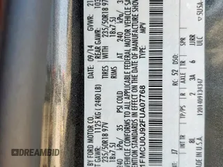 2015 Ford Escape Titanium z VIN 1FMCU0J92FUA07768, wystawiony jako Copart lot #53382545 z przebiegiem Nie podano mil oraz Szkoda całkowita • Salvage title. Historia ofert i sprzedaży dostępna na DreamBid. Obrazek 16.