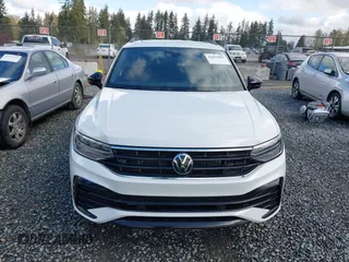 2023 Volkswagen Tiguan SE R-Line Black with VIN 3VVCB7AX3PM014446, listed as a IAAI auction lot 42016885 with 12,726 mi miles and . Bid and sale history available at DreamBid. Image 12.