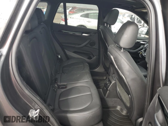 2019 BMW X1 xDrive28i with VIN WBXHT3C58K5L97890, listed as a Copart auction lot 47076465 with 73,400 mi miles and Salvage title. Bid and sale history available at DreamBid. Image 10.