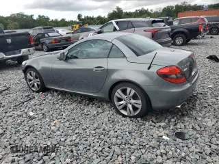2010 Mercedes-Benz SLK with VIN WDBWK5JA7AF228325, listed as a Copart auction lot 55966235 with 41,728 mi miles and Salvage title. Bid and sale history available at DreamBid. Image 2.