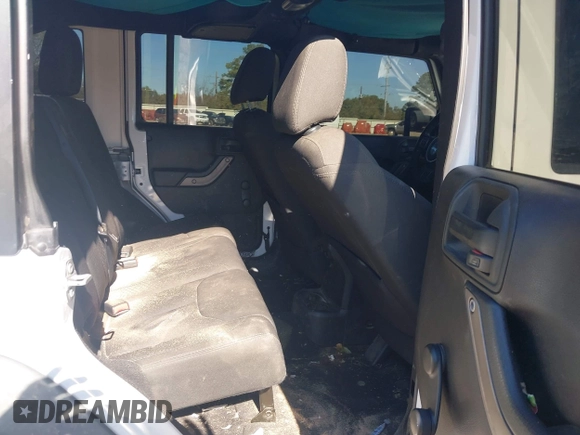 2017 Jeep Wrangler Unlimited Sport with VIN 1C4BJWDG4HL502861, listed as a IAAI auction lot 40895010 with 62,970 mi miles. Bid and sale history available at carsss.com. Image 8.