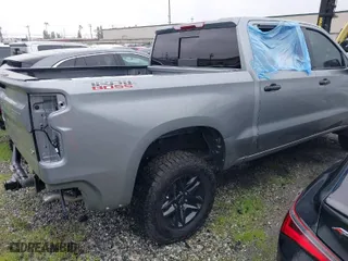 2024 Chevrolet Silverado 1500 LT Trail Boss with VIN 3GCUDFED8RG336847, listed as a IAAI auction lot 41502602 with 5,227 mi miles. Bid and sale history available at carsss.com. Image 4.