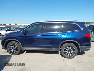 2020 Honda Pilot Elite with VIN 5FNYF6H02LB054348, listed as a IAAI auction lot 42302525 with 43,916 mi miles and . Bid and sale history available at DreamBid. Image 14.