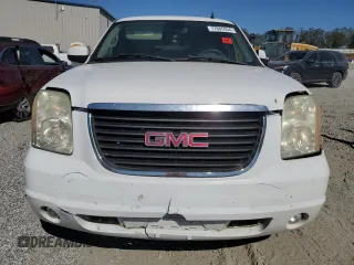 2007 GMC Yukon SLE with VIN 1GKFK13017J109923, listed as a Copart auction lot 77085954 with 214,986 mi miles and Salvage Title. Bid and sale history available at carsss.com. Image 5.