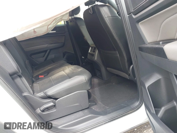 2021 Volkswagen Atlas SEL z VIN 1V2SE2CA7MC214805, wystawiony jako IAAI lot #42374591 z przebiegiem 61 775 mil mil oraz . Historia ofert i sprzedaży dostępna na DreamBid. Obrazek 8.