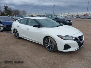 2021 Nissan Maxima SV with VIN 1N4AA6CV1MC504255, listed as a IAAI auction lot 41728763 with 112,524 mi miles and . Bid and sale history available at DreamBid. Image 1.