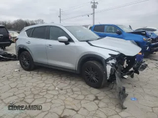 2020 Mazda CX-5 Touring z VIN JM3KFBCM2L0768348, wystawiony jako Copart lot #87813065 z przebiegiem Nie podano mil oraz Szkoda całkowita • Salvage title. Historia ofert i sprzedaży dostępna na DreamBid. Obrazek 4.
