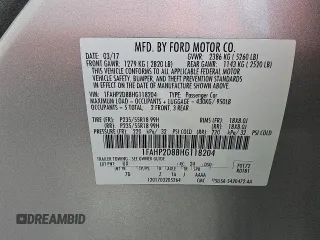 2017 Ford Taurus SE with VIN 1FAHP2D88HG118204, listed as a Copart auction lot 55104105 with 99,444 mi miles and Clean Title. Bid and sale history available at DreamBid. Image 12.