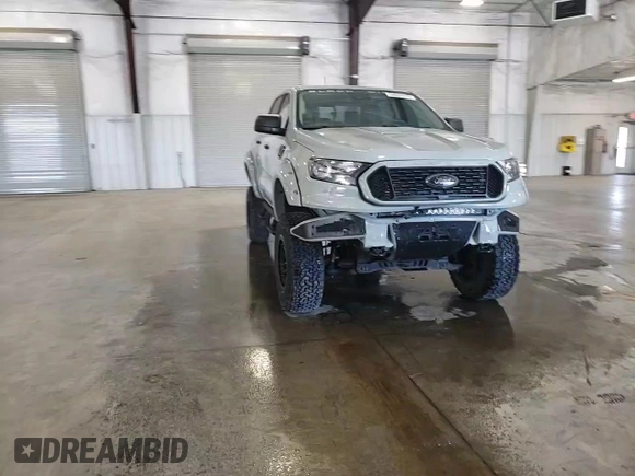 2021 Ford Ranger XL with VIN 1FTER4FH2MLD97098, listed as a Copart auction lot 56696975 with 21,565 mi miles and Salvage title. Bid and sale history available at DreamBid. Image 13.