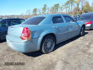 2009 Chrysler 300 LX with VIN 2C3KA43D19H552759, listed as a IAAI auction lot 41702989 with 172,572 mi miles. Bid and sale history available at carsss.com. Image 4.