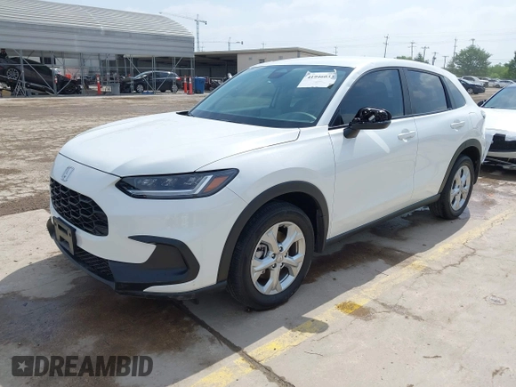 2023 Honda HR-V LX z VIN 3CZRZ1H34PM716838, wystawiony jako IAAI lot #41946033 z przebiegiem 24 958 mil mil oraz . Historia ofert i sprzedaży dostępna na DreamBid. Obrazek 19.