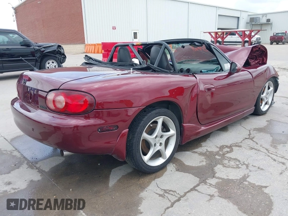 2003 Mazda MX-5 Miata Cloth with VIN JM1NB353130304852, listed as a IAAI auction lot 42145498 with Not provided miles and . Bid and sale history available at DreamBid. Image 4.