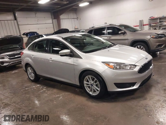2015 Ford Focus SE with VIN 1FADP3F28FL357382, listed as a IAAI auction lot 41223441 with 47,682 mi miles. Bid and sale history available at carsss.com. Image 1.