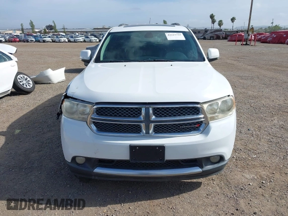 2013 Dodge Durango Crew with VIN 1C4SDHDT2DC679600, listed as a IAAI auction lot 42215737 with 128,499 mi miles and . Bid and sale history available at DreamBid. Image 12.