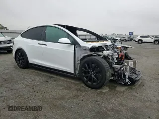 2023 Tesla Model X with VIN 7SAXCAE58PF379943, listed as a Copart auction lot 86352354 with Not Provided miles and Salvage Title. Bid and sale history available at DreamBid. Image 12.