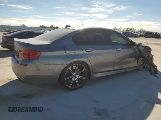 2014 BMW M5 with VIN WBSFV9C52ED097797, listed as a Copart auction lot 81085504 with 83,990 mi miles and Salvage Title. Bid and sale history available at carsss.com. Image 3.