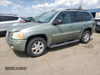 2003 GMC Envoy SLT with VIN 1GKDT13S032112192, listed as a Copart auction lot 54351985 with 297,007 mi miles and Clean Title. Bid and sale history available at carsss.com. Image 1.