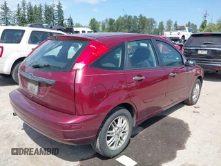 2007 Ford Focus S z VIN 1FAFP37N27W177462, wystawiony jako IAAI lot #42465629 z przebiegiem 169 895 mil mil oraz . Historia ofert i sprzedaży dostępna na DreamBid. Obrazek 4.