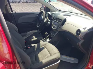 2016 Chevrolet Sonic LT with VIN 1G1JC6SH7G4127373, listed as a IAAI auction lot 41970423 with 130,440 mi miles. Bid and sale history available at carsss.com. Image 5.