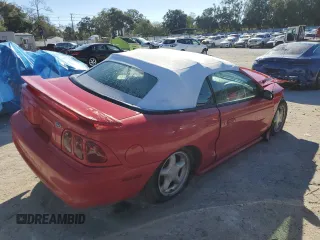 1998 Ford Mustang with VIN 1FAFP4449WF180634, listed as a Copart auction lot 82671504 with 150,195 mi miles and Salvage Title. Bid and sale history available at carsss.com. Image 3.
