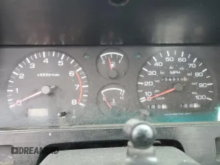 1993 Nissan Frontier SE z VIN 1N6HD16Y0PC408188, wystawiony jako Copart lot #71028394 z przebiegiem 258 939 mil mil oraz Szkoda całkowita • Salvage title. Historia ofert i sprzedaży dostępna na DreamBid. Obrazek 9.