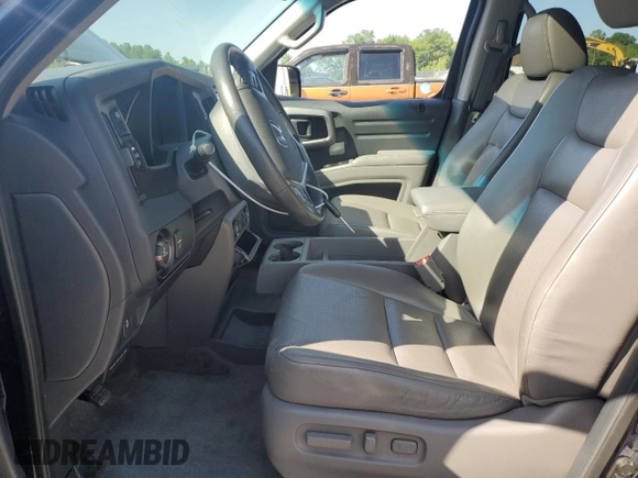 2012 Honda Ridgeline RTL with VIN 5FPYK1F54CB452813, listed as a Copart auction lot 62020825 with 79,176 mi miles and Salvage title. Bid and sale history available at DreamBid. Image 7.