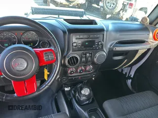 2012 Jeep Wrangler Sport with VIN 1C4GJWAG5CL201499, listed as a Copart auction lot 55247615 with 116,414 mi miles and Clean Title. Bid and sale history available at carsss.com. Image 9.
