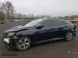 2019 Honda Civic Sedan LX with VIN 2HGFC2F61KH541132, listed as a Copart auction lot 54123545 with 101,261 mi miles and Clean Title. Bid and sale history available at carsss.com. Image 1.