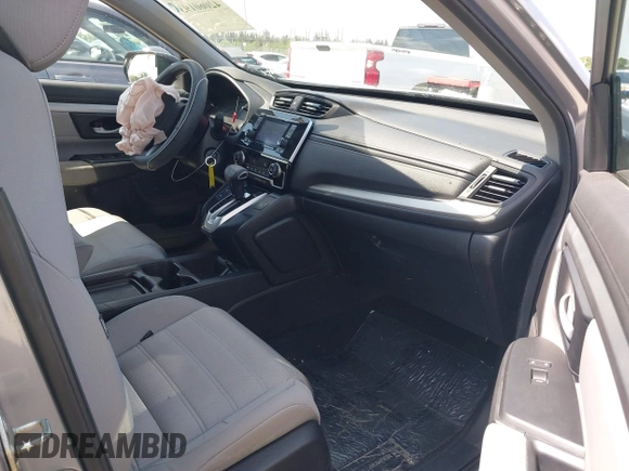 2019 Honda CR-V LX with VIN 2HKRW5H31KH411771, listed as a IAAI auction lot 42060193 with 175,036 mi miles and . Bid and sale history available at DreamBid. Image 5.