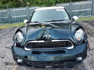 2013 MINI Paceman S ALL4 z VIN WMWSS7C53DWN71470, wystawiony jako Copart lot #66497254 z przebiegiem 125 803 mil mil oraz Szkoda całkowita • Salvage title. Historia ofert i sprzedaży dostępna na DreamBid. Obrazek 5.