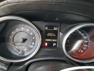 2012 Jeep Grand Cherokee SRT8 with VIN 1C4RJFDJ2CC329621, listed as a Copart auction lot 86772154 with 236,800 mi miles and Salvage Title. Bid and sale history available at carsss.com. Image 9.