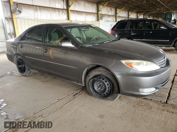 2004 Toyota Camry LE with VIN 4T1BE32K74U884720, listed as a Copart auction lot 49534195 with 253,516 mi miles and Salvage Title. Bid and sale history available at DreamBid. Image 4.