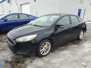 2017 Ford Focus SE with VIN 1FADP3F29HL265488, listed as a Copart auction lot 46978045 with 214,535 mi miles and Salvage title. Bid and sale history available at DreamBid. Image 1.