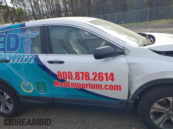 2019 Honda CR-V LX with VIN 2HKRW5H35KH419548, listed as a IAAI auction lot 41923516 with 127,746 mi miles and . Bid and sale history available at carsss.com. Image 13.