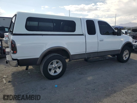 2002 Ford F-150 XL z VIN 1FTRX18L42NB40419, wystawiony jako Copart lot #60486205 z przebiegiem 241 853 mil mil oraz Szkoda całkowita • Salvage title. Historia ofert i sprzedaży dostępna na DreamBid. Obrazek 3.