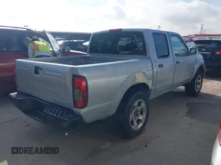 2001 Nissan Frontier z VIN 1N6MD27T91C386609, wystawiony jako IAAI lot #42304953 z przebiegiem 125 921 mil mil oraz . Historia ofert i sprzedaży dostępna na DreamBid. Obrazek 4.