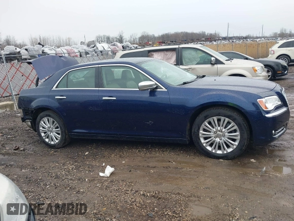 2013 Chrysler 300 Luxury Series with VIN 2C3CCASGXDH564717, listed as a IAAI auction lot 41716331 with 133,220 mi miles. Bid and sale history available at carsss.com. Image 13.