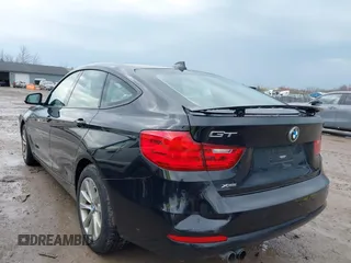 2014 BMW 3 Series 328i Gran Turismo xDrive z VIN WBA3X5C51ED558871, wystawiony jako IAAI lot #41940706 z przebiegiem 74 126 mil mil oraz . Historia ofert i sprzedaży dostępna na DreamBid. Obrazek 3.