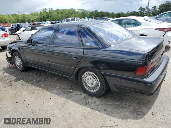 1989 Ford Taurus z VIN 1FABP54Y5KA202935, wystawiony jako Copart lot #59355304 z przebiegiem 67 510 mil mil oraz Szkoda całkowita • Salvage title. Historia ofert i sprzedaży dostępna na DreamBid. Obrazek 2.