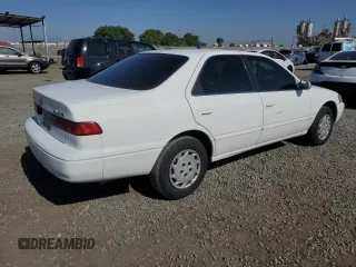 1997 Toyota Camry LE z VIN JT2BG22K4V0077954, wystawiony jako Copart lot #57682355 z przebiegiem 254 596 mil mil oraz Szkoda całkowita • Salvage title. Historia ofert i sprzedaży dostępna na DreamBid. Obrazek 3.