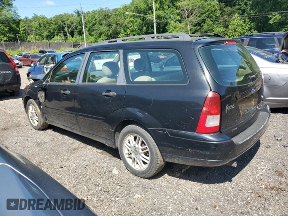 2004 Ford Focus ZTW with VIN 1FAFP35Z84W203676, listed as a Copart auction lot 57272835 with 183,115 mi miles and Salvage title. Bid and sale history available at DreamBid. Image 2.
