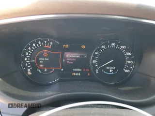 2015 Lincoln MKC z VIN 5LMCJ1A94FUJ47221, wystawiony jako Copart lot #55670615 z przebiegiem 143 926 mil mil oraz Szkody całkowita. Historia ofert i sprzedaży dostępna na DreamBid. Obrazek 9.